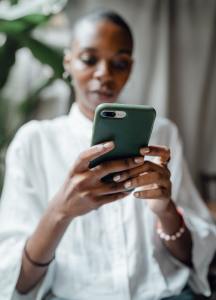 Black woman using iPhone