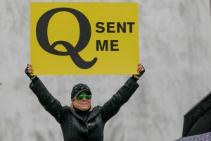 Q-Anon conspiracy theorists hold signs during the protest at the State Capitol in Salem, Oregon, United States on May 2, 2020. (John Rudoff/Anadolu Agency via Getty Images)