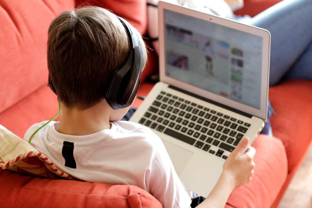 Boy Playing Video Game On Computer (Getty Images)