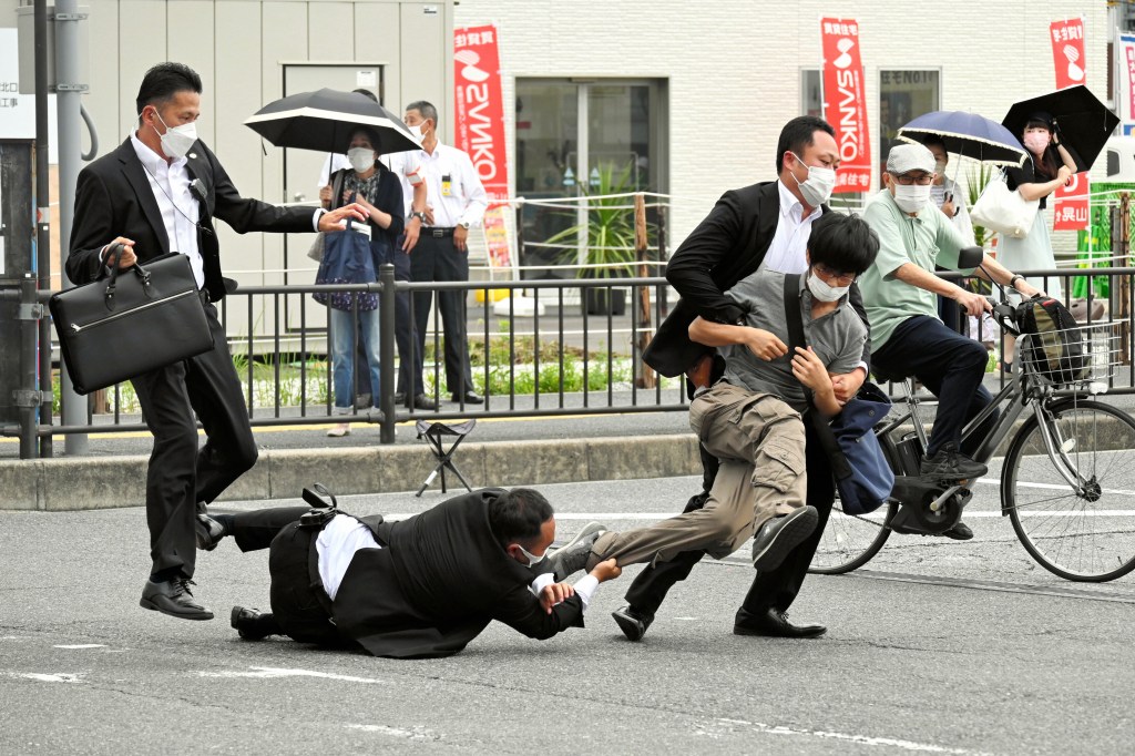 JAPANESE POLICE ARRESTED A MAN WHO FATALLY SHOT FORMER JAPANESE PRIME MINISTER SHINZO ABE. PHOTO: THE ASAHI SHIMBUN VIA GETTY IMAGES