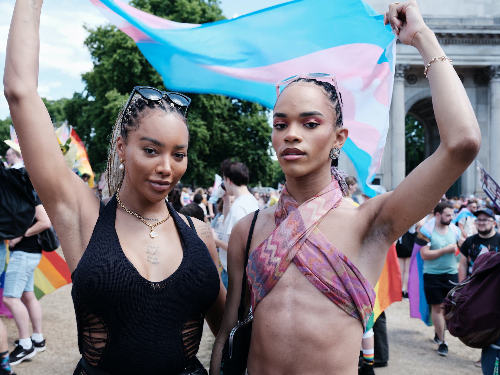 protesters holding signs at London Trans+ Pride 2022