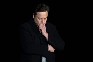 Elon Musk thinking face.