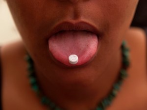 Woman with pill