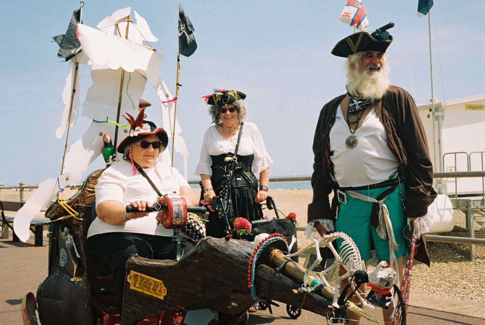 Three pirate fanatics on the beach for 'Pirate Day' in Hastings