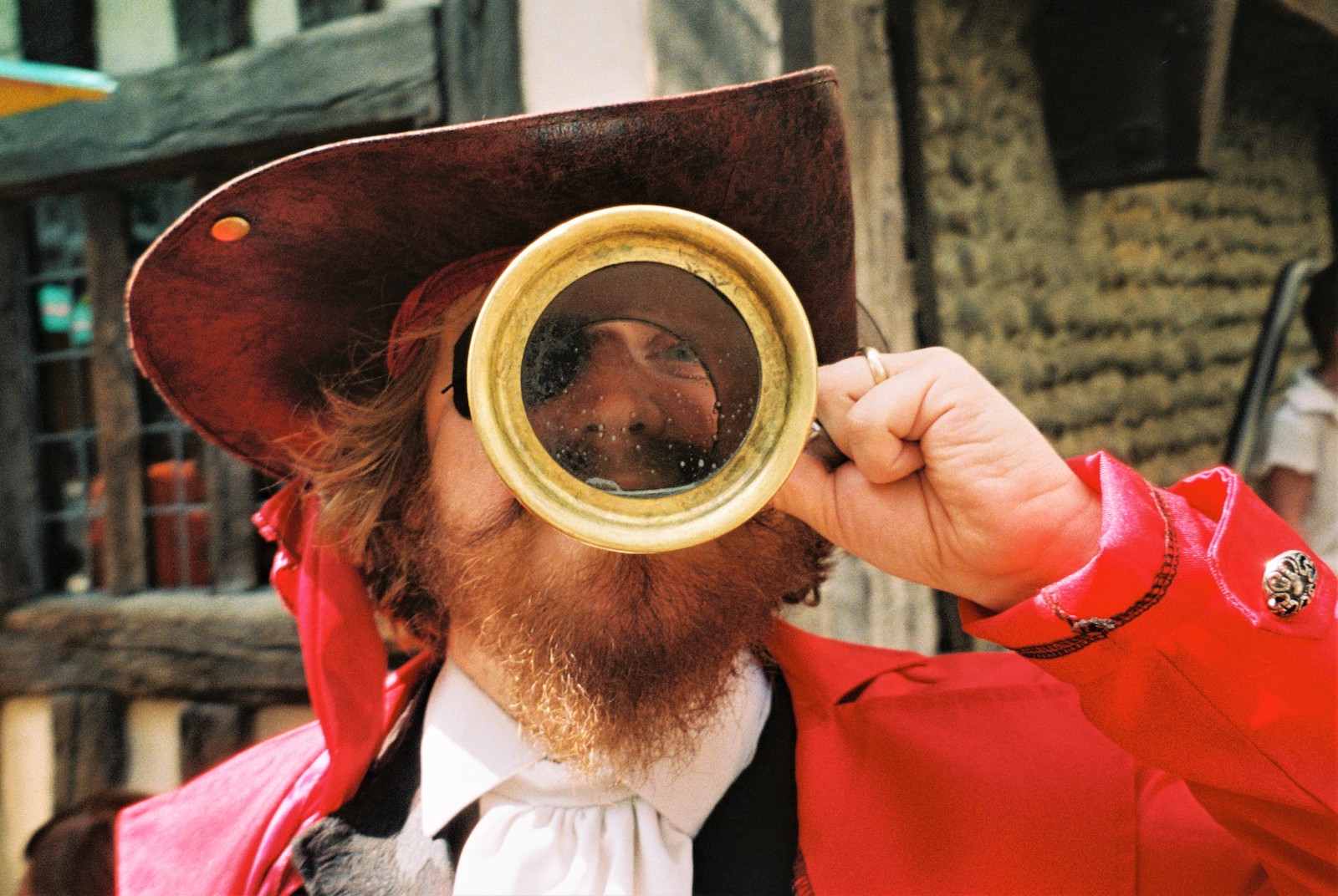 A pirate knocking back some beer on Pirate Day in Hastings