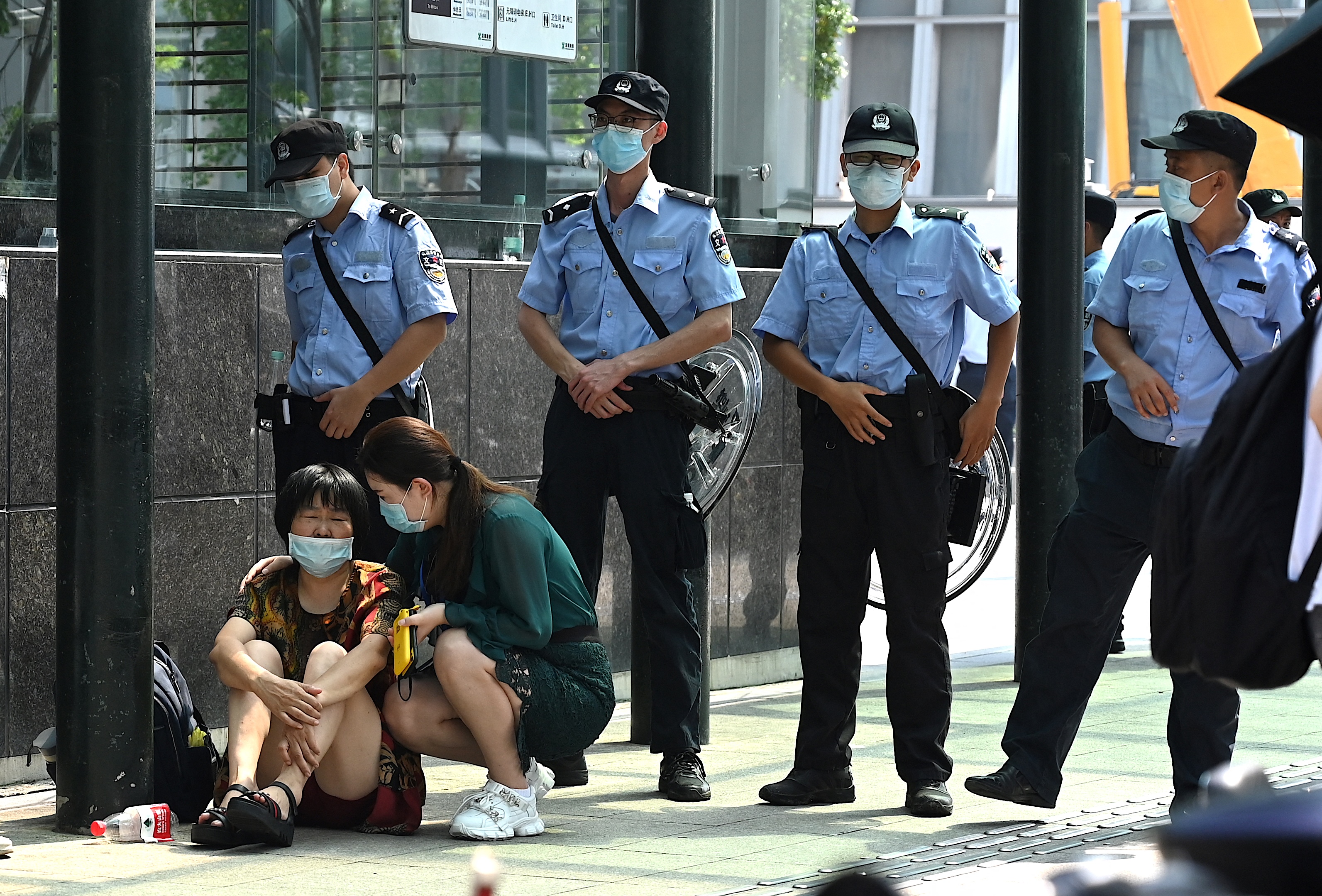 PROTESTERS GATHERED AT THE HEADQUARTERS OF PROPERTY GIANT EVERGRANDE IN SEPTEMBER. PHOTO: NOEL CELIS/AFP