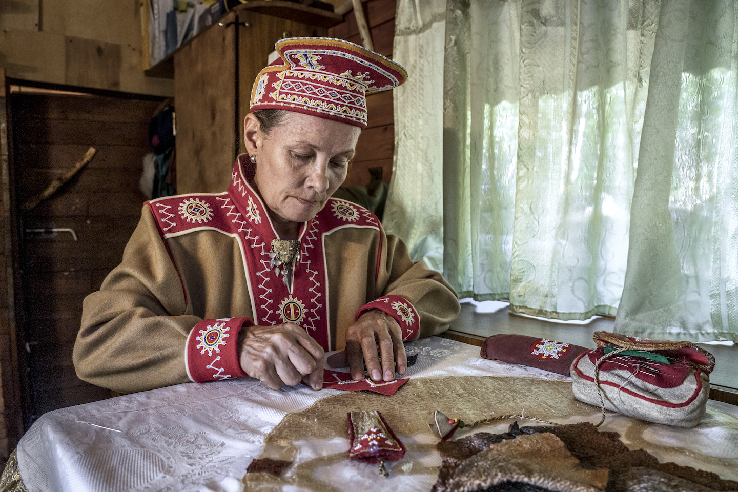 A woman working with textiles.