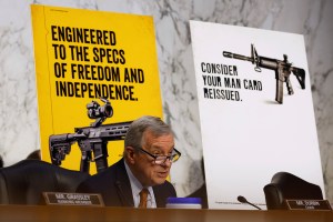 Senate Judiciary Committee Chairman Richard Durbin (D-IL) speaks in front of a published advertisements for assault weapons during a hearing about the mass shooting in Highland Park, Illinois, and civilian access to military-style weapons on July 20, 2022