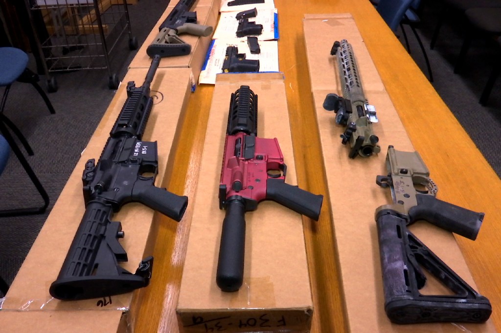 This Nov. 27, 2019, file photo shows "ghost guns" on display at the headquarters of the San Francisco Police Department in San Francisco.