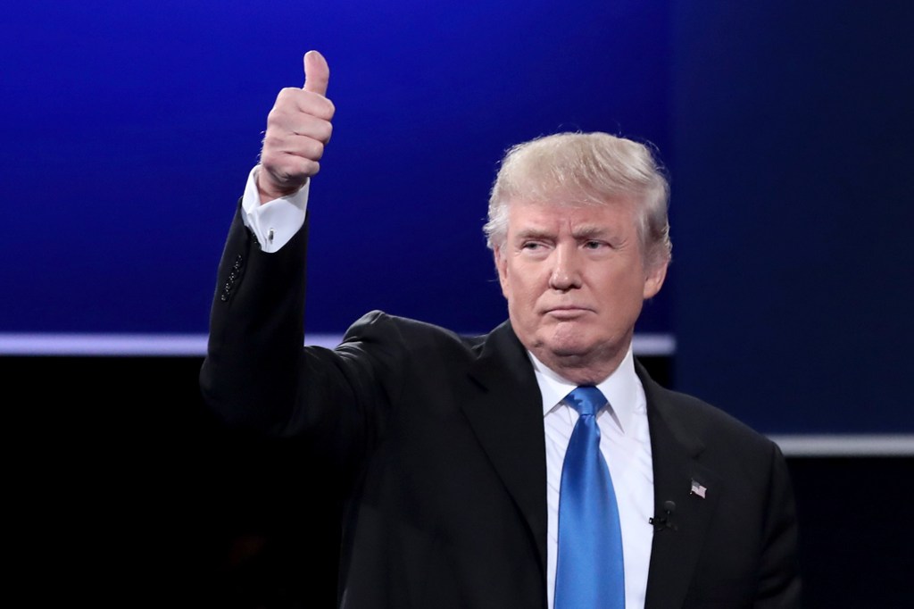 Then presidential nominee Donald Trump appears at a presidential debate with nominee Hillary Clinton on September 26, 2016 in Hempstead, New York.