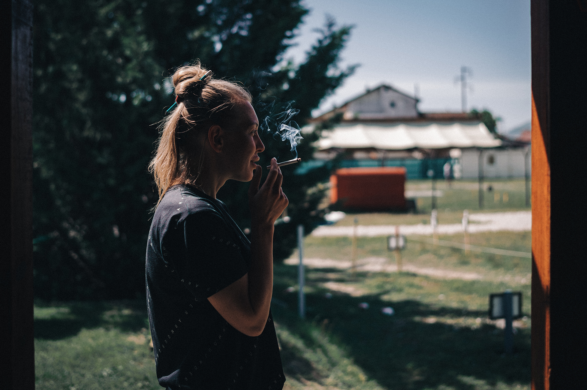 Kateryna Grybinichenko takes an afternoon smoke break between lessons.