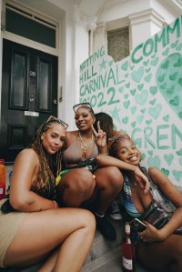 Three women in their 20s sitting in Ladbroke