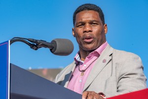 Heisman Trophy winner and Republican candidate for US Senate Herschel Walker speaks to supporters of former U.S. President Donald Trump during a rally at the Banks County Dragway on March 26, 2022 in Commerce, Georgia. (Megan Varner/Getty Images)