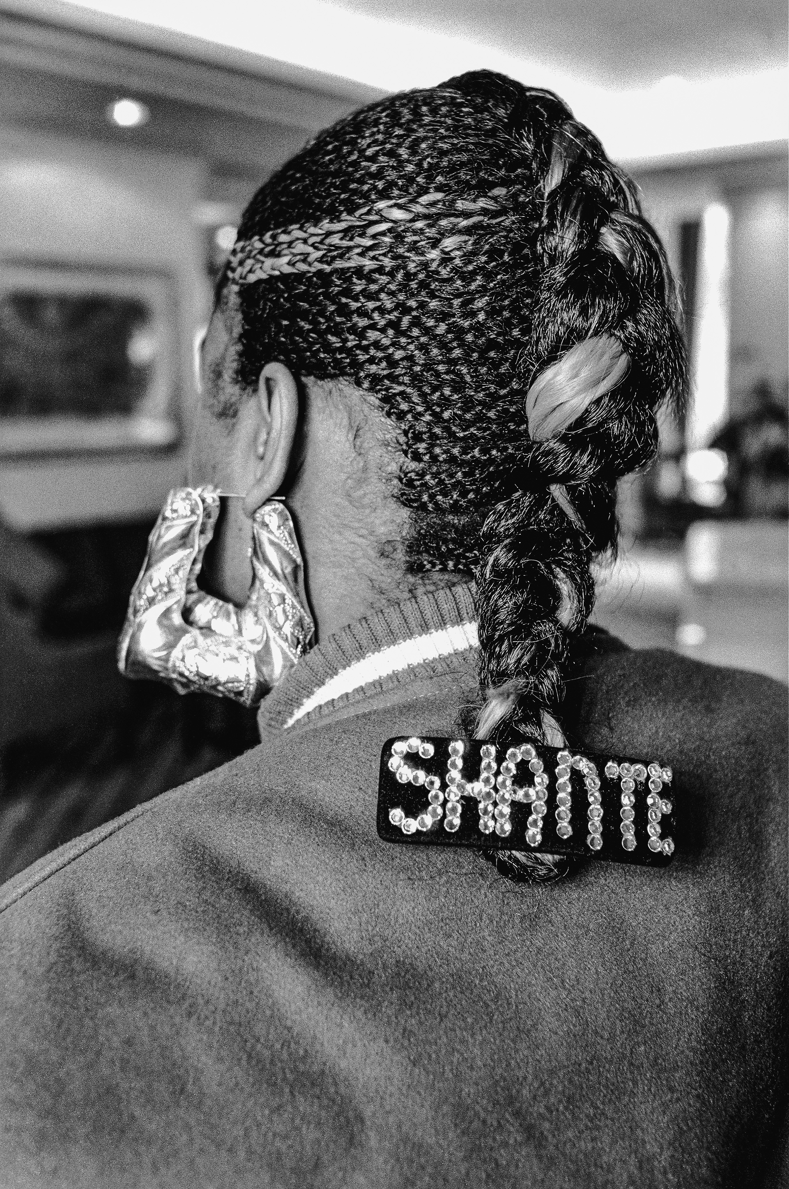 Roxanne Shante Gold door knocker earrings and “Shante” nameplate hair adornment. David Corio, London, 1989