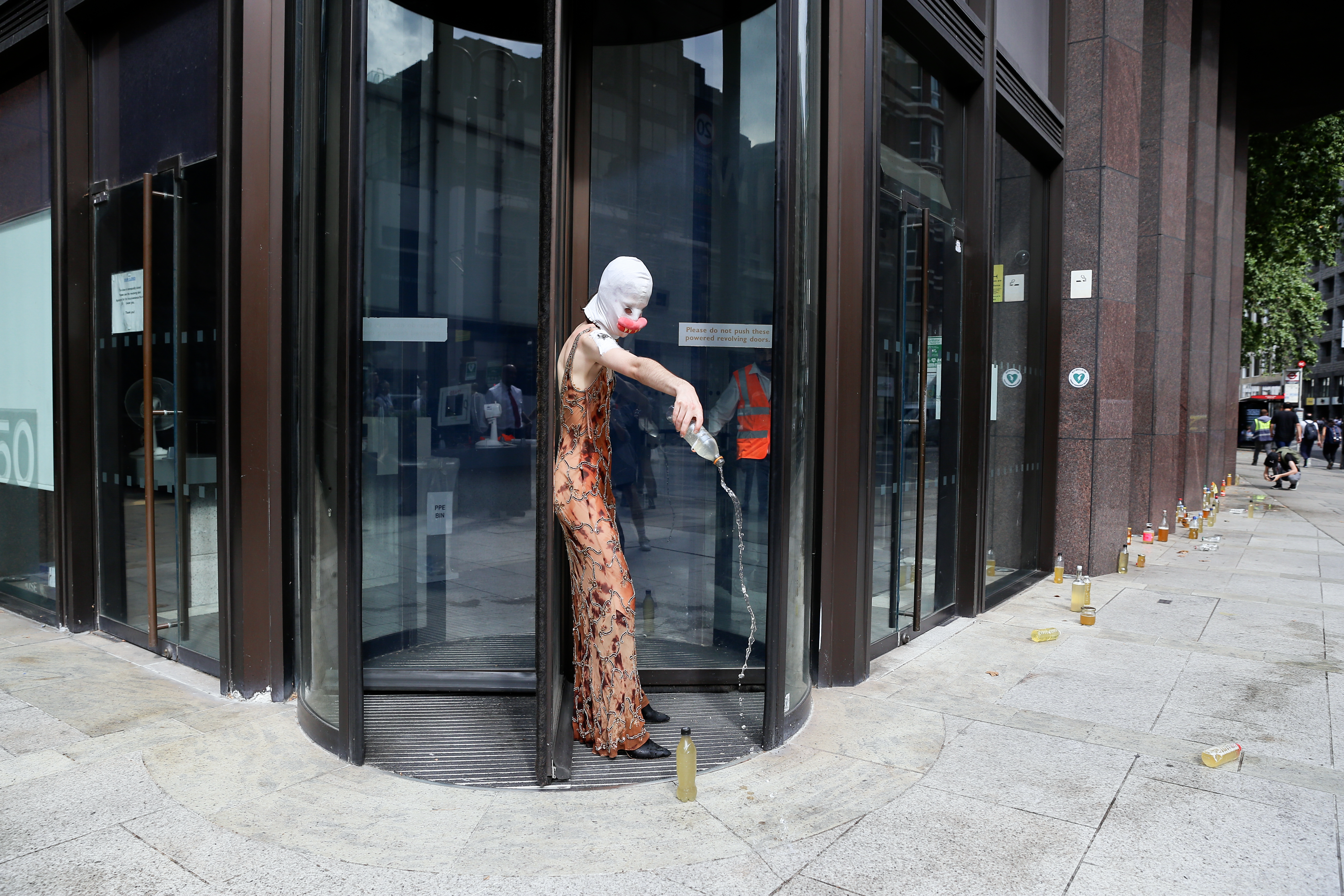 A POT activist outside the EHRC office.