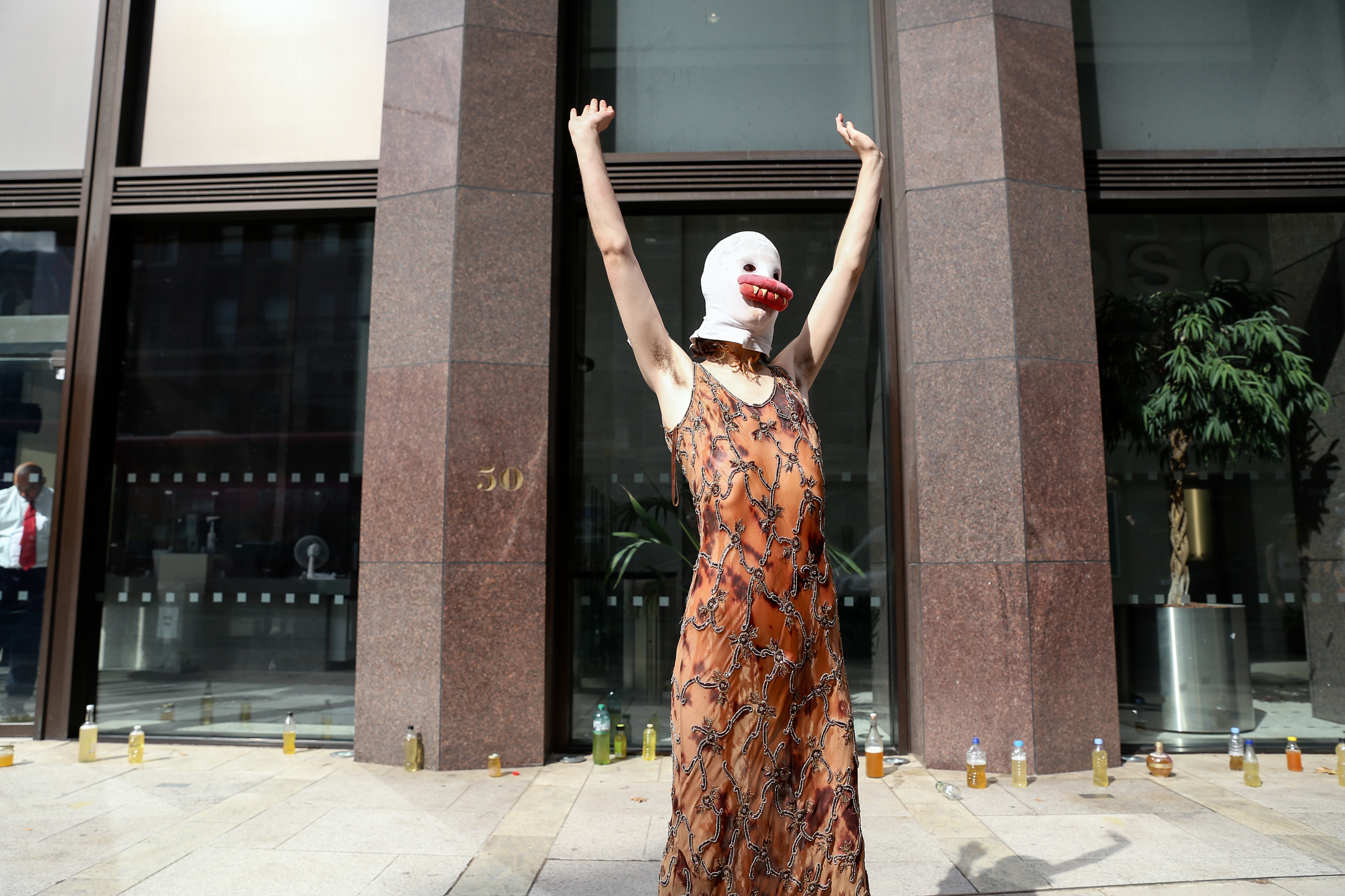 A POT activist outside the EHRC office.