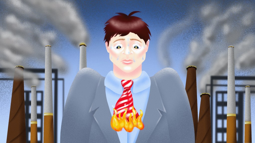 A man who works in oil and gas with his tie on fire