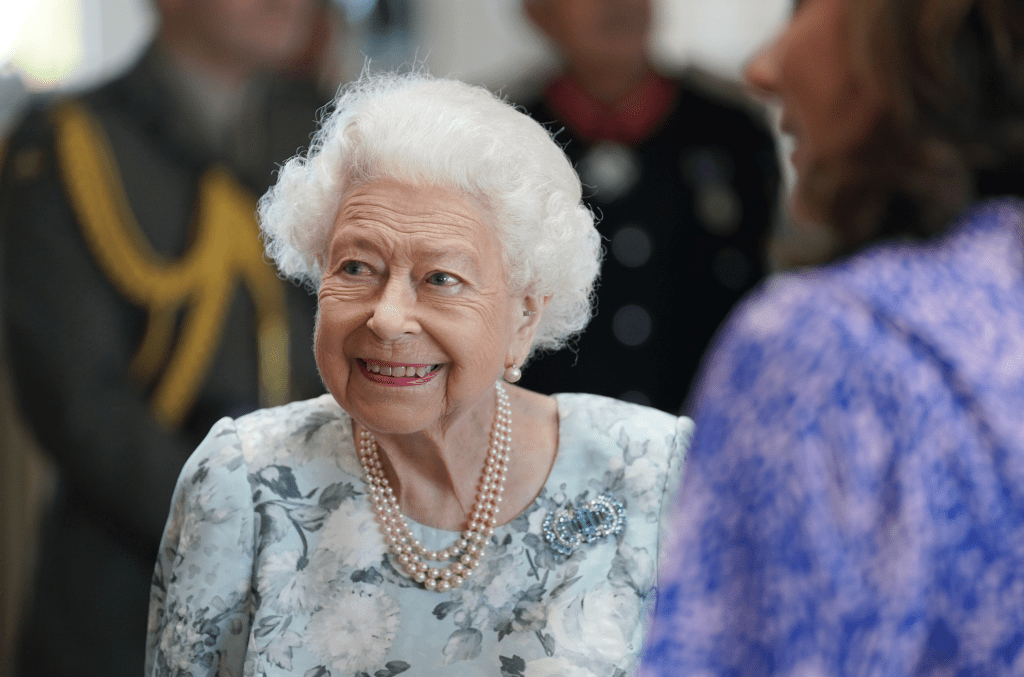 Queen Elizabeth II smiles during a visit to officially open the new building at Thames Hospice on July 15, 2022 in Maidenhead, England.