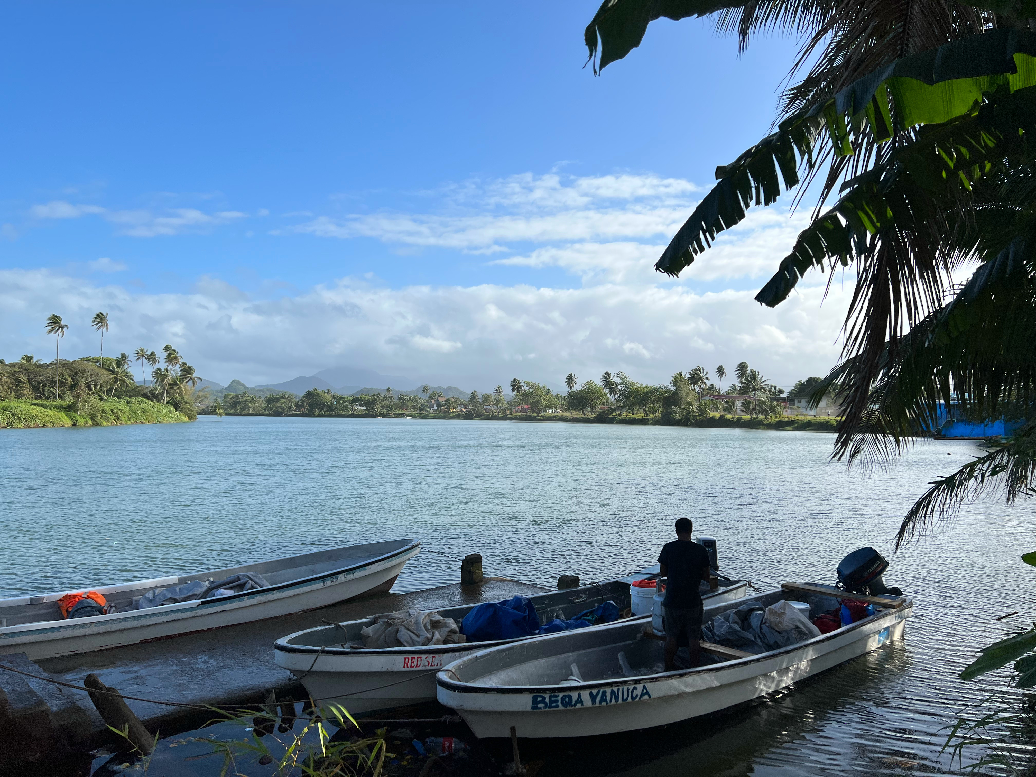 Boats moored at the riverside in Navua, 30 kilometres outside of Suva. Photo: Gavin Butler