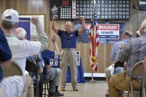 Republican candidate for Senate, retired United States Army brigadier general Don Bolduc, center, during a campaign rally at an American Legion Hall.