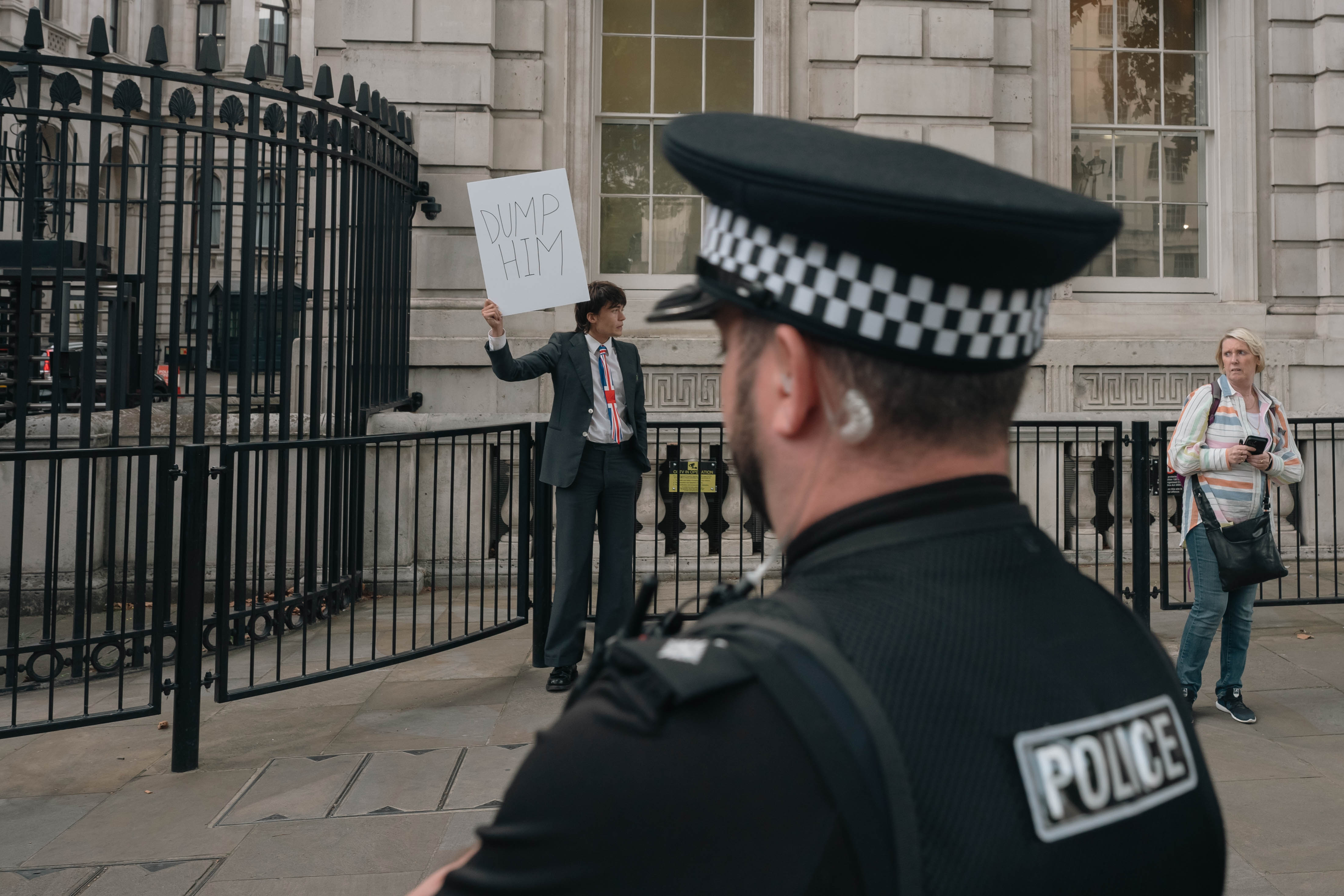 A police officer looks at author carrying a