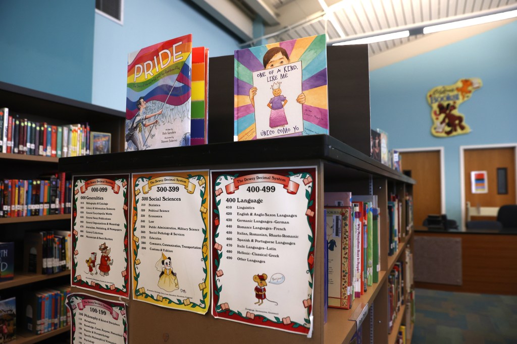 A library shelf displaying chiLGBTQ-inclusive books for children