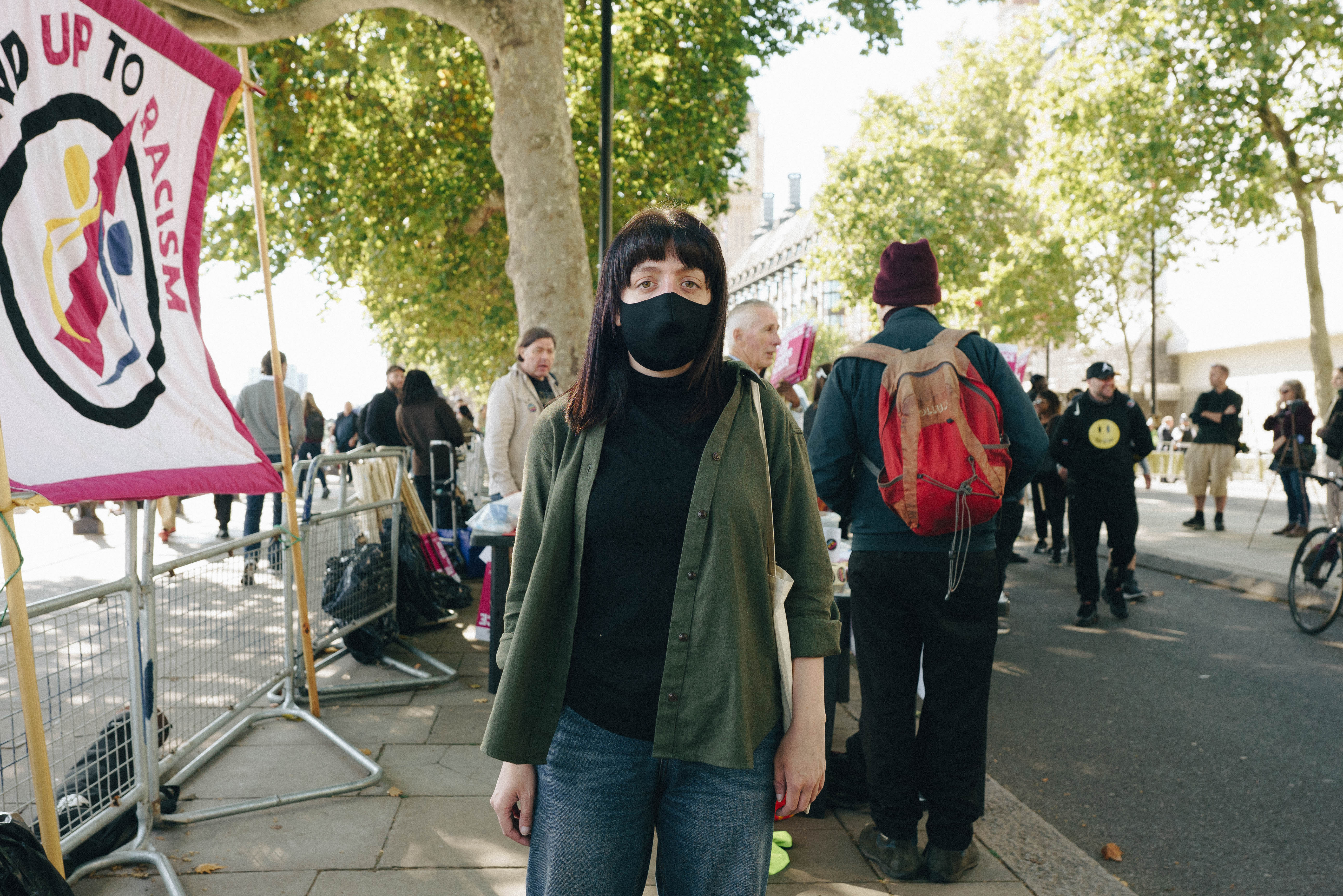 Woman in face mask at the Chris Kaba protest