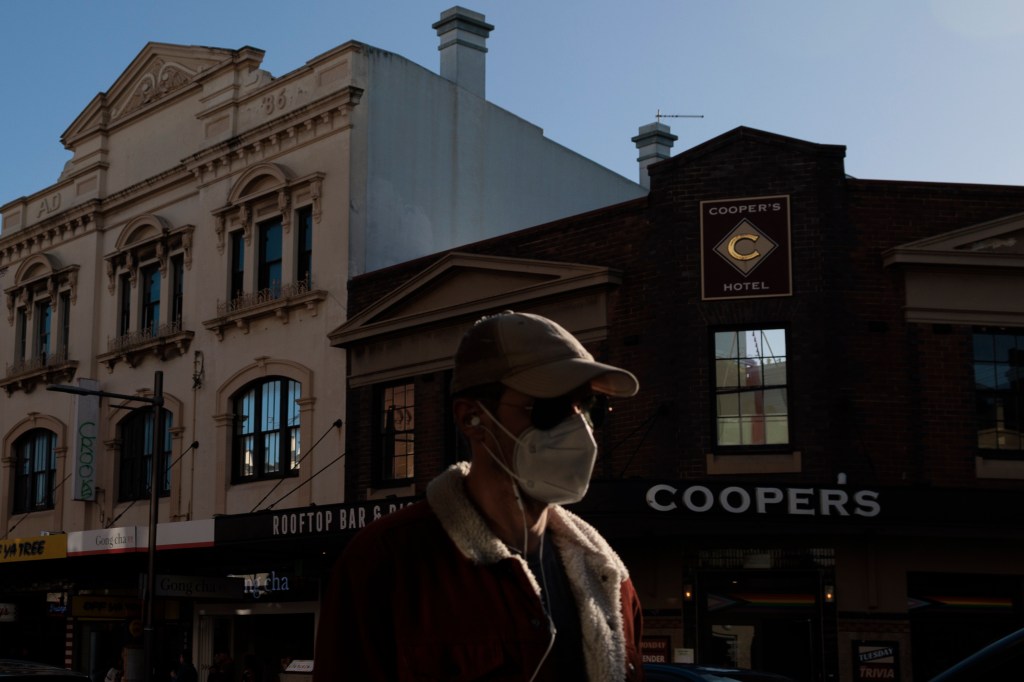 Man wears mask on street