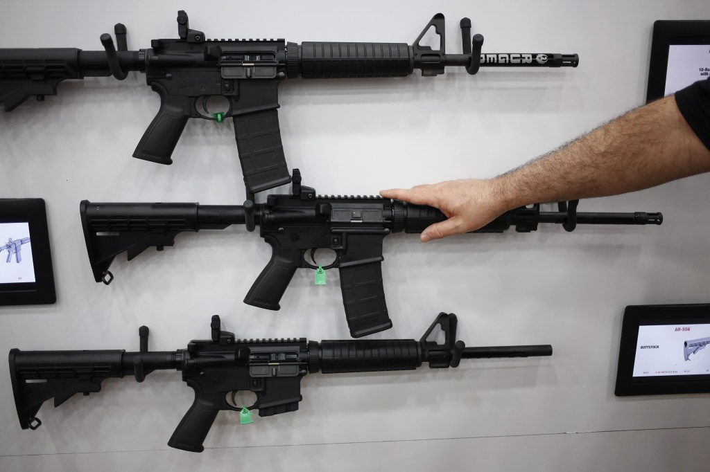 AR-15 rifles are displayed on the exhibit floor during the National Rifle Association (NRA) annual meeting in Louisville, Kentucky, U.S., on Friday, May 20, 2016.