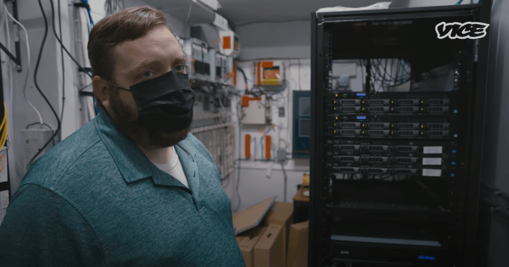 A system administrator in a school's server room.