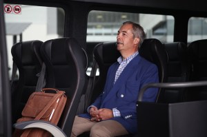 Nigel Farage sits on a bus in Sydney