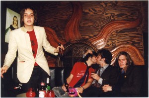 The Strokes drinking beer and kissing