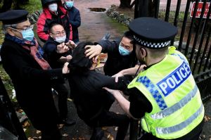 A HONG KONG PROTESTER WAS DRAGGED INSIDE CHINESE CONSULATE GROUNDS IN THE UK AND BEATEN UP. PHOTO: MATTHEW LEUNG/THE CHASER NEWS​