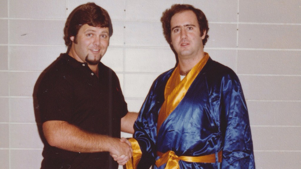 Lawler and Kaufman wrestling match shaking hands