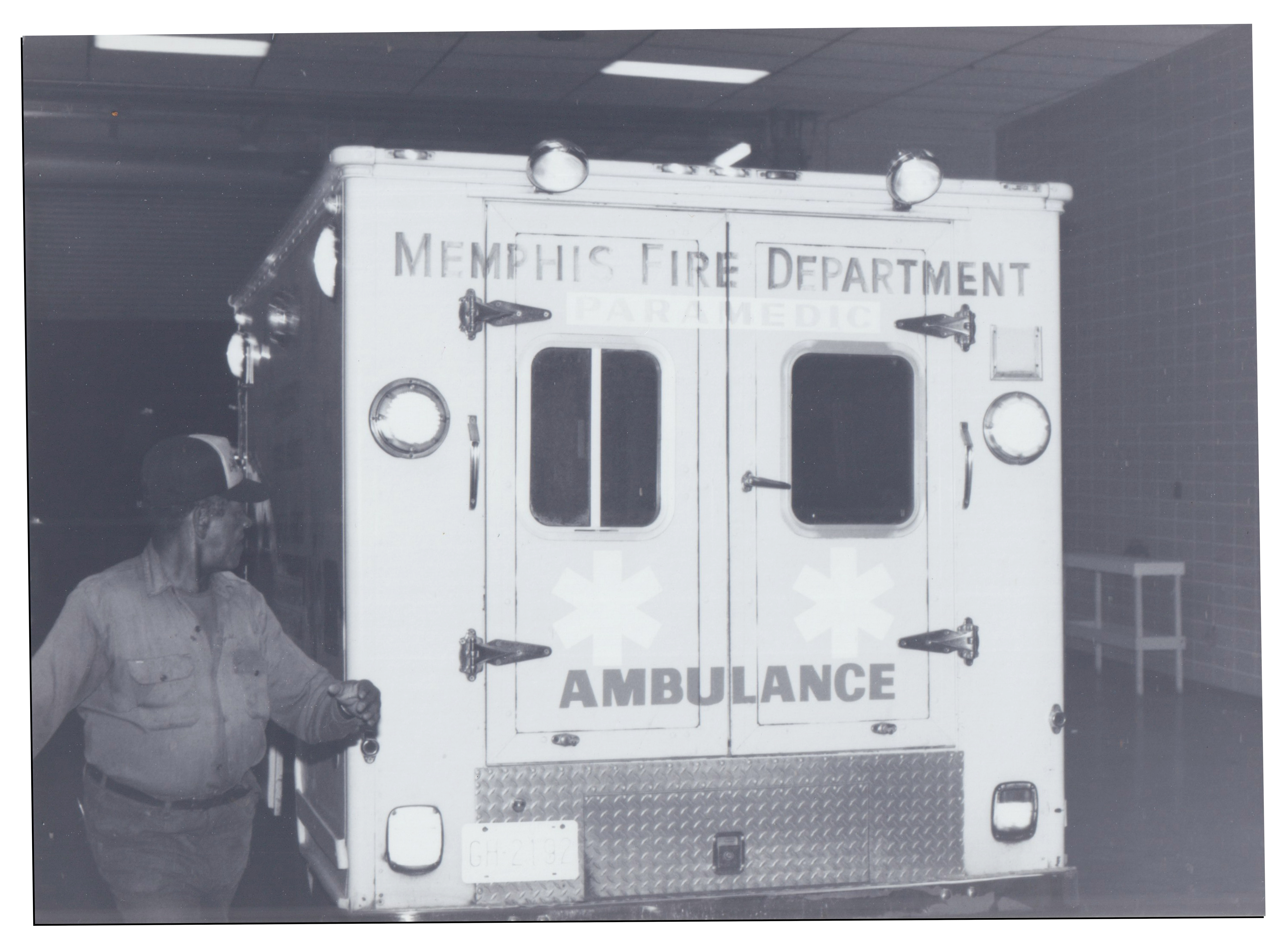 An ambulance taking Kaufman to the hospital in black and white film photo