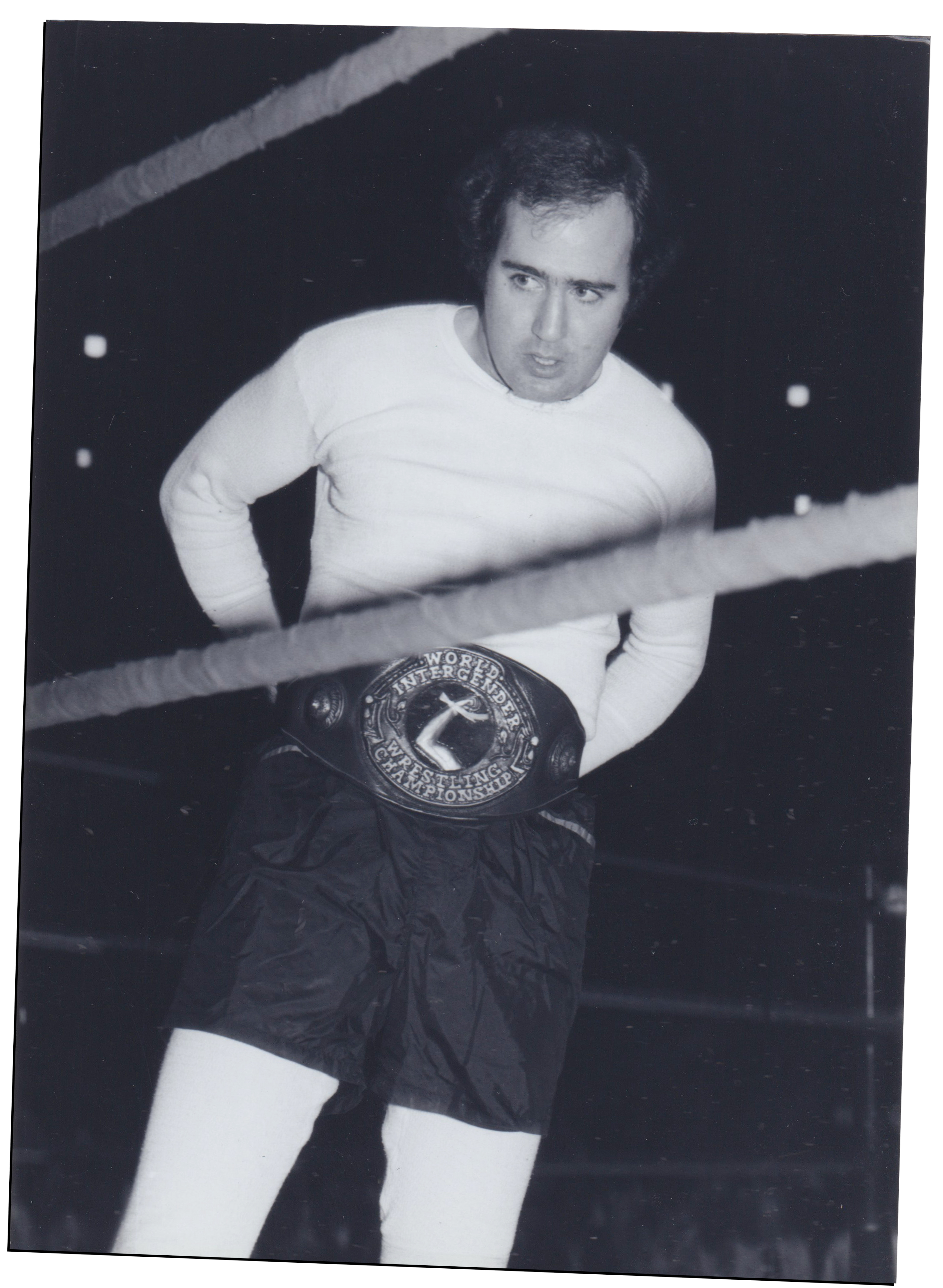 Kaufman in ring with belt in black and white film photo