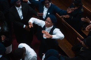 A Black congregation worshipping