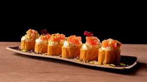 Sushi Pizza – bite-sized pieces of focaccia bread shaped into sushi-like ovals and topped with salmon, white cream and almonds