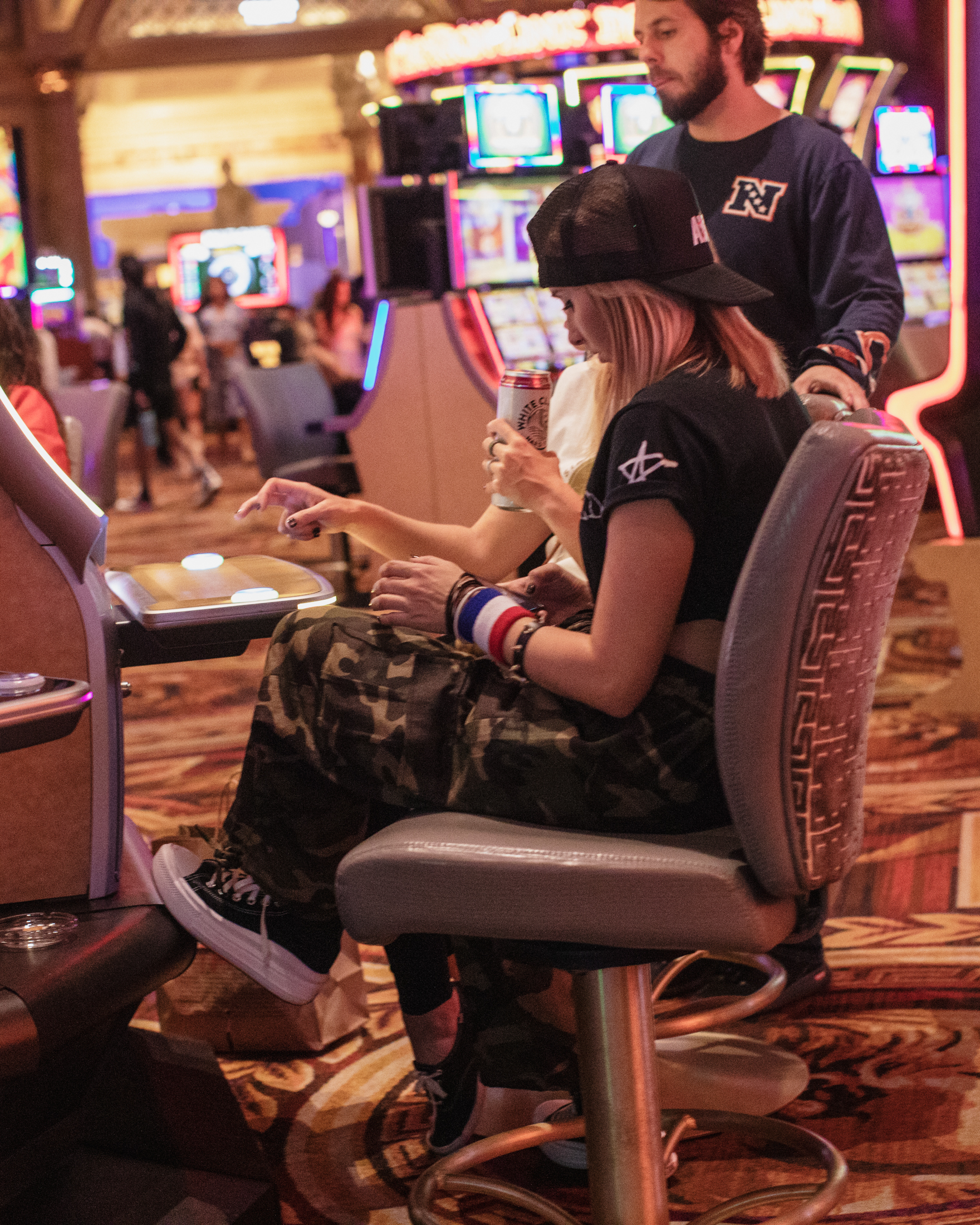 A couple of emos by the slot machines in Las Vegas for When We Were Young