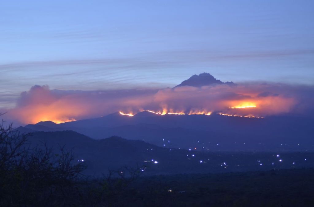 Clouds of smoke from a fire on Kilimanjaro.