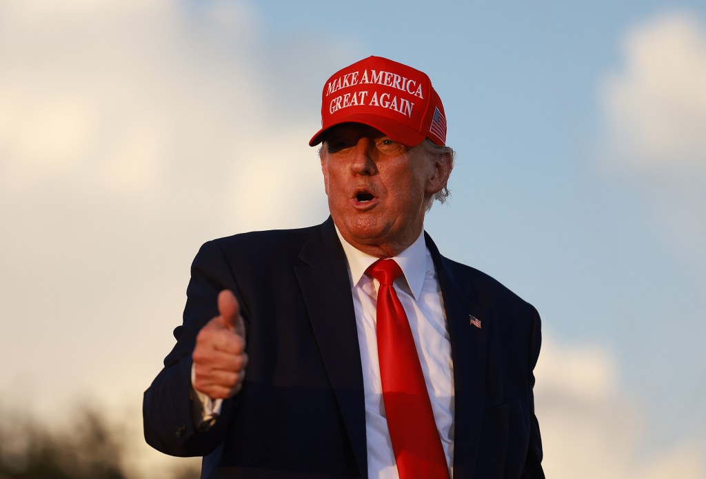 Former U.S. President Donald Trump gestures during a rally for Sen. Marco Rubio (R-FL) on November 6, 2022 in Miami, Florida.