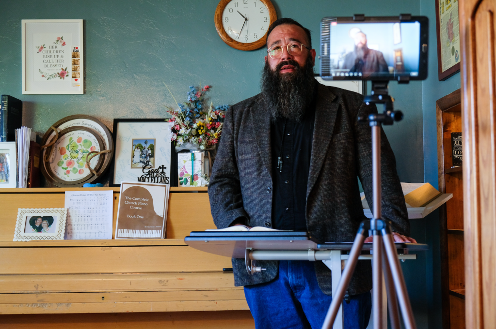 Pastor David MacLellan, a member of the growing national religious movement called the Black Robe Regiment, gets ready to give a sermon at his home.​