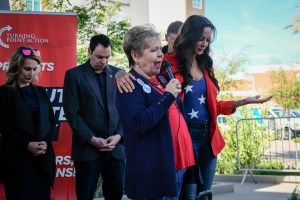 Debra Schinke and Lindsay Graham, aka "Patriot Barbie" lead a campaign rally in prayer in Arizona earlier this week