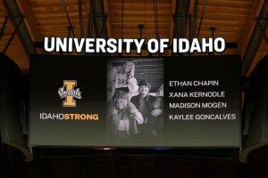 A photo and the names of four University of Idaho students who were killed over the weekend at a residence near campus are displayed during a moment of silence, Wednesday, Nov. 16, 2022, before an NCAA college basketball game between Idaho and Cal-State B