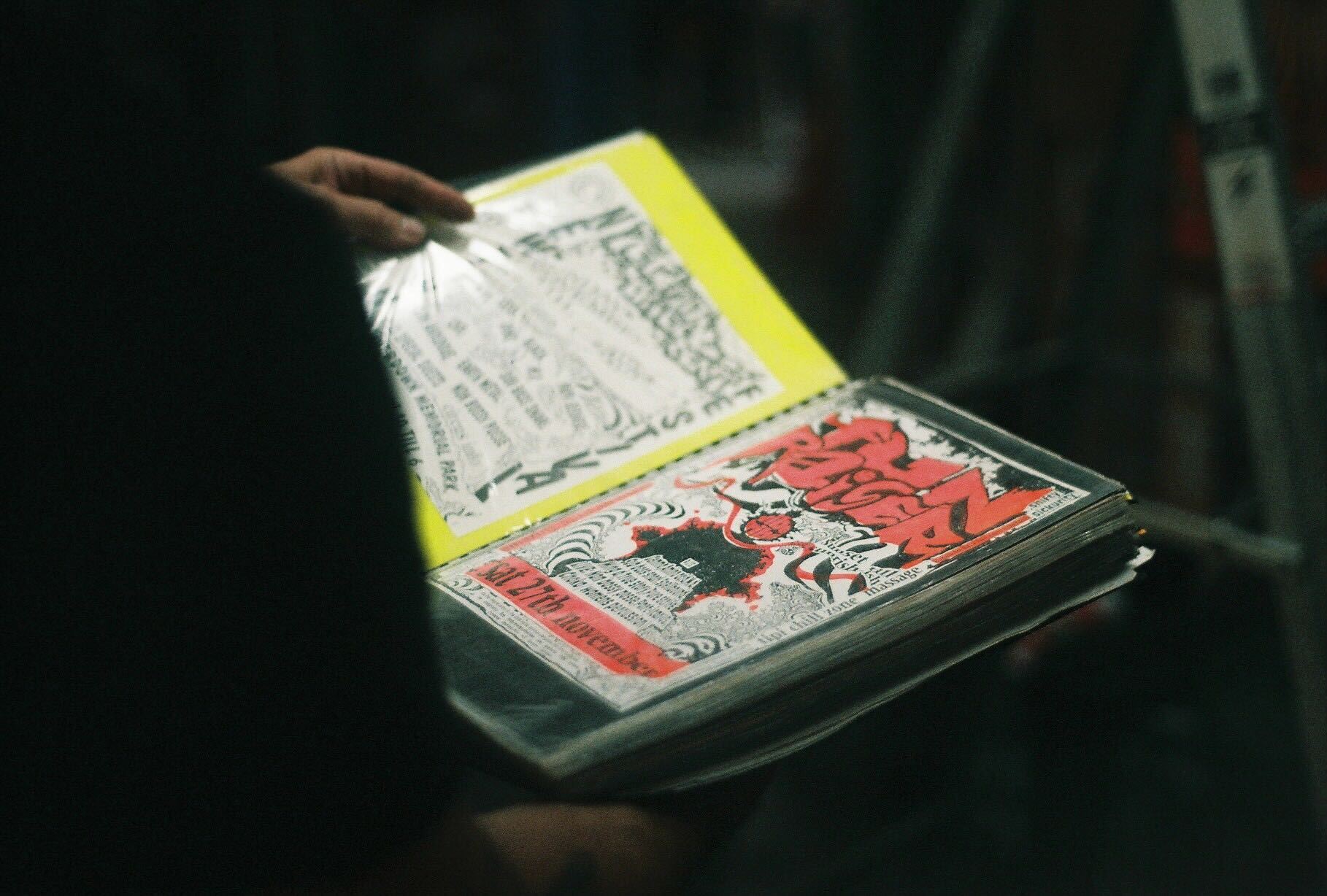 Vibe Tribe's Pete Strong with Old rave posters from the 90's (Photo by Julie Fenwick)