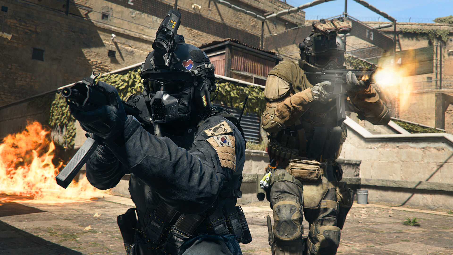 A screenshot of Call of Duty: Warzone 2.0 depicting two characters walking towards the camera firing their weapons.