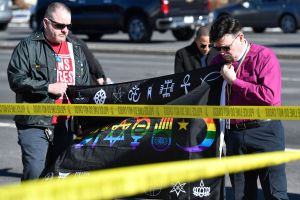 The person accused of killing five people in a mass shooting at an LGBTQ nightclub had previously changed their name after being the subject of intense online harassment.