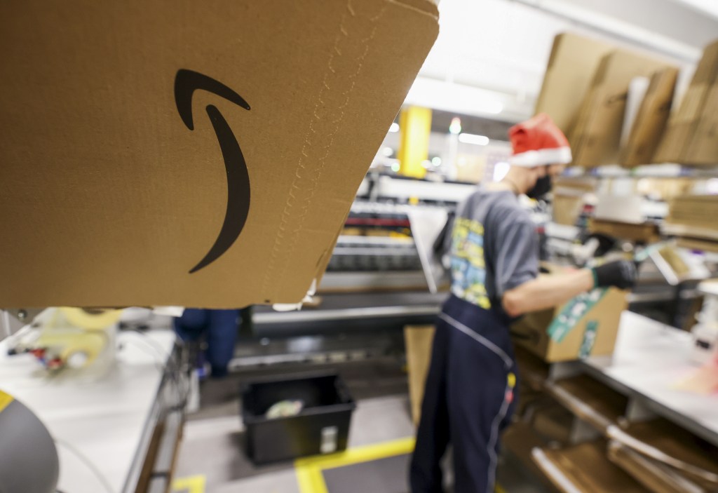 amazon worker with santa hat