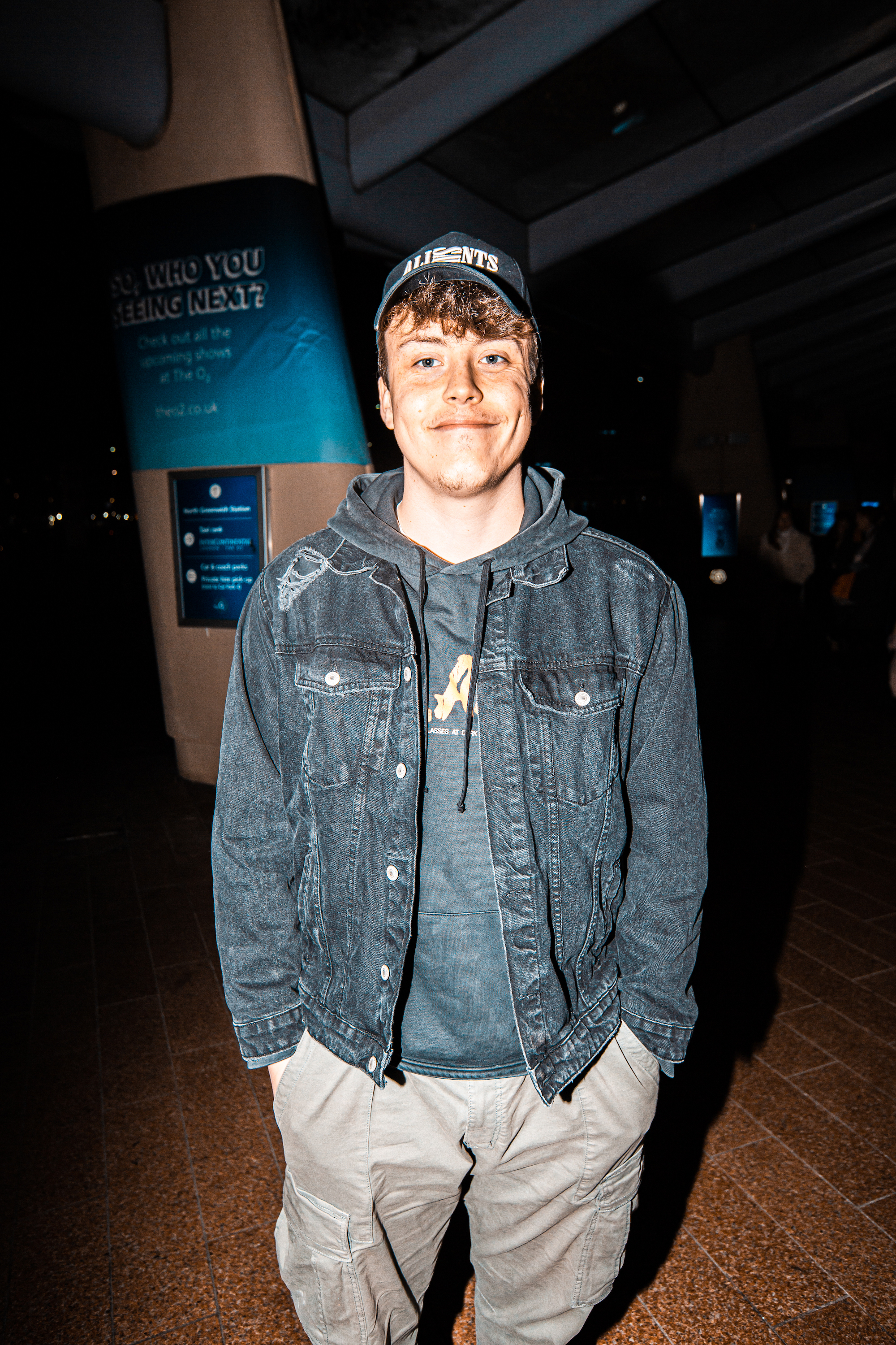 A Peter Kay fan outside his London O2 gig in a denim jacket