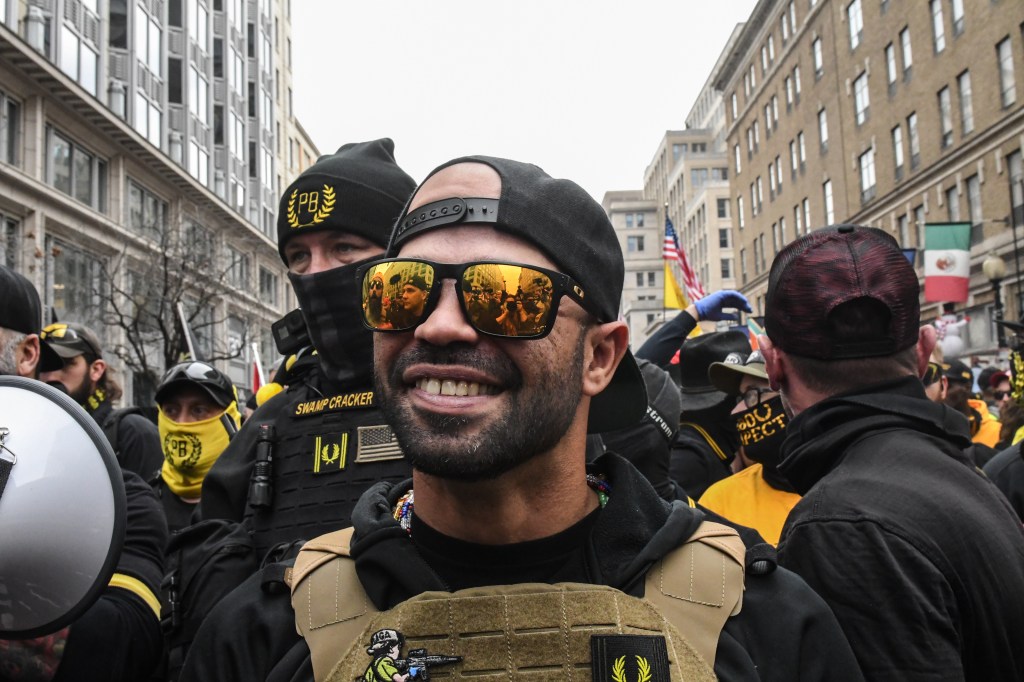 Enrique Tarrio, leader of the Proud Boys, stands outside Harry's bar during a protest on December 12, 2020 in Washington, DC.